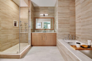 bathroom with tub and free standing shower at The Beacon at Garvies Point